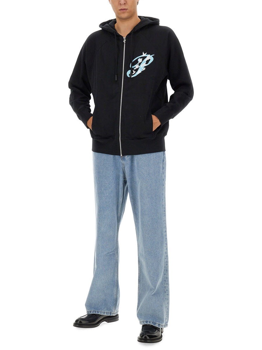 ZIP SWEATSHIRT.