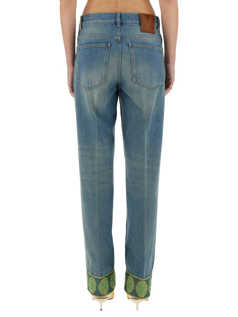 DENIM PANTS WITH JACQUARD EDGES