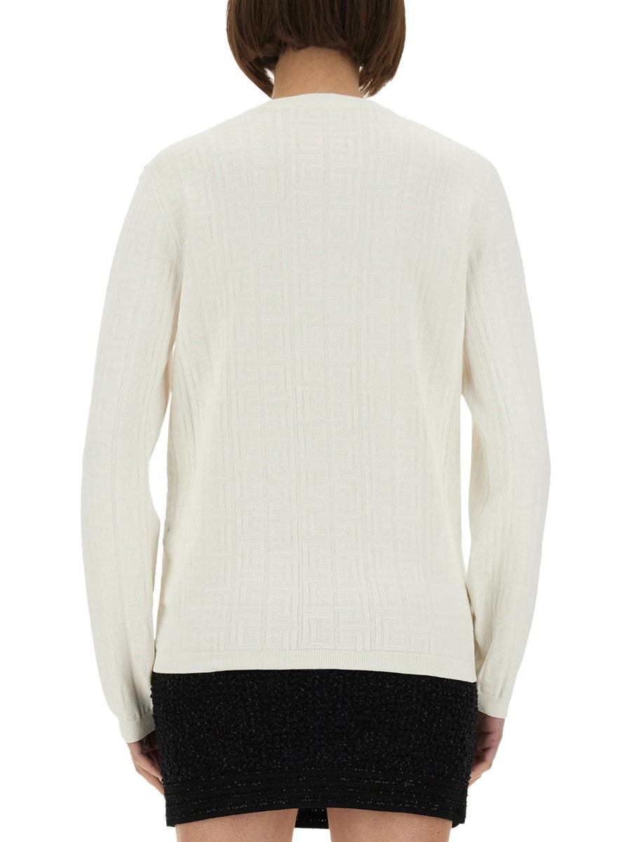 KNITTED TOPS.