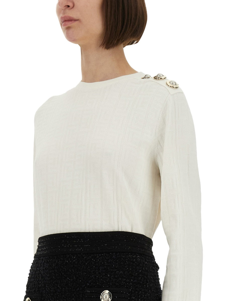 KNITTED TOPS.