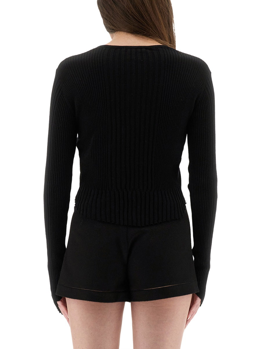 KNITTED TOPS.