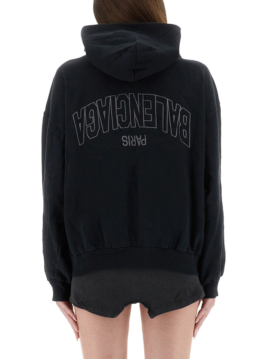 "FLIPPED" ZIPPERED SWEATSHIRT