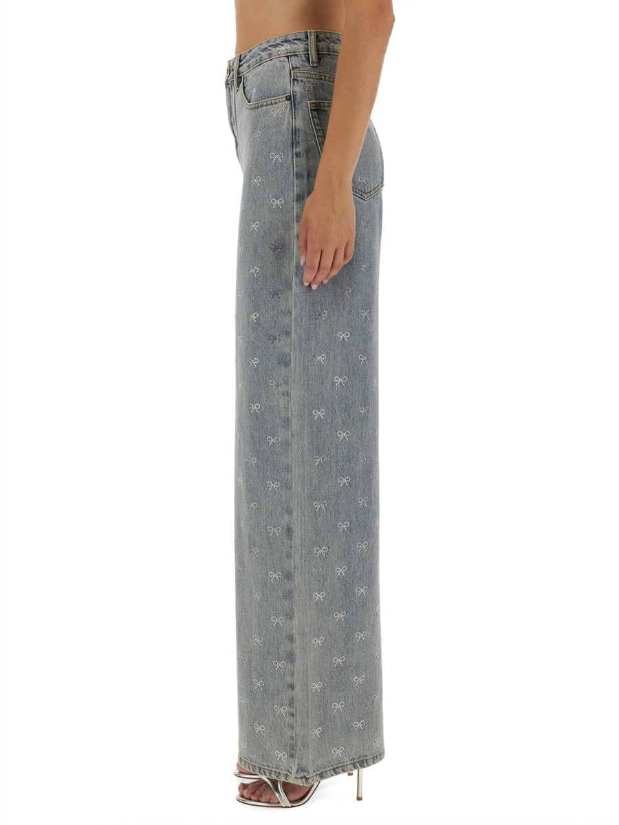JEANS WITH RHINESTONE BOWS