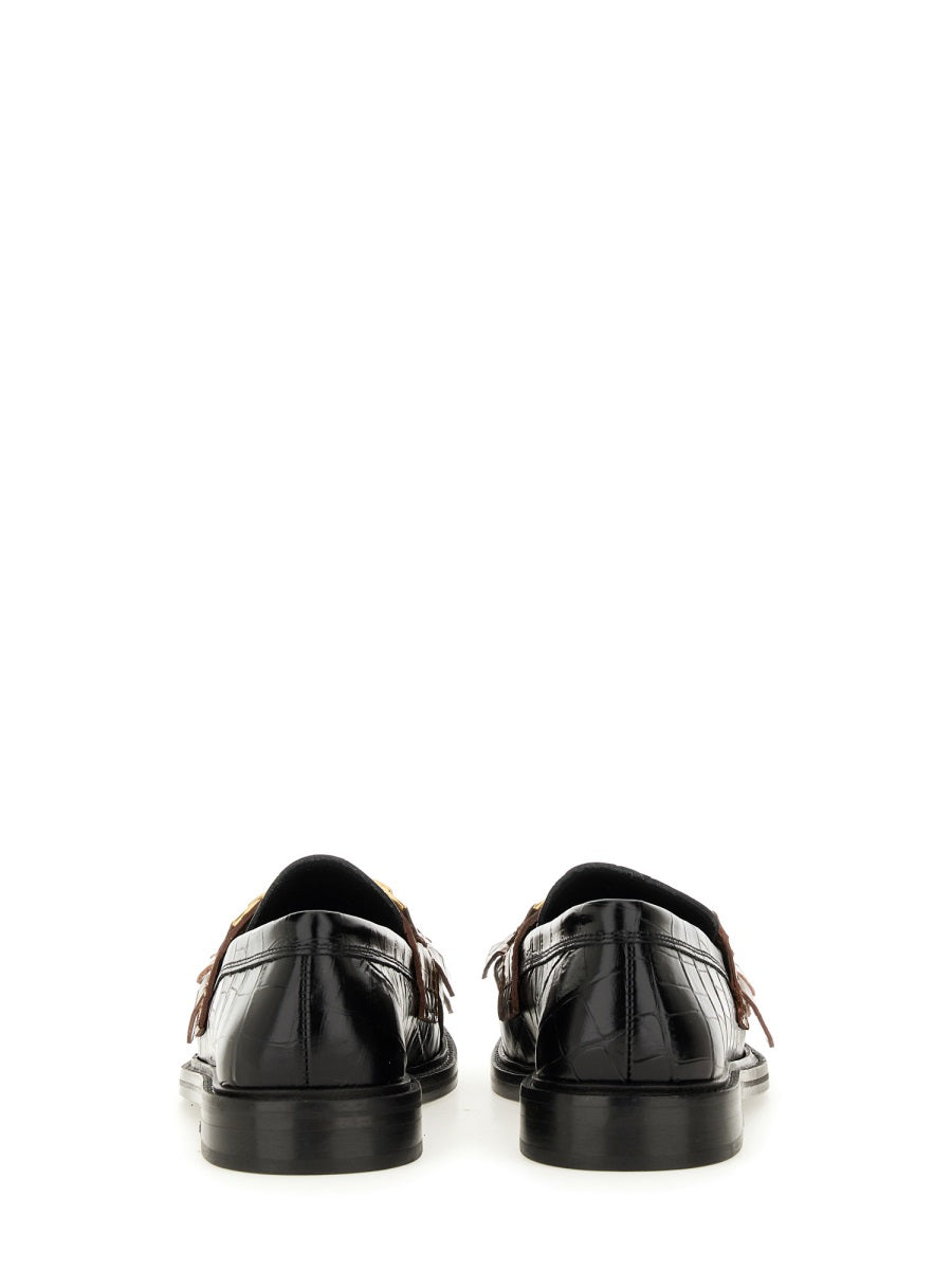 MOCCASIN WITH BANGS AND COIN