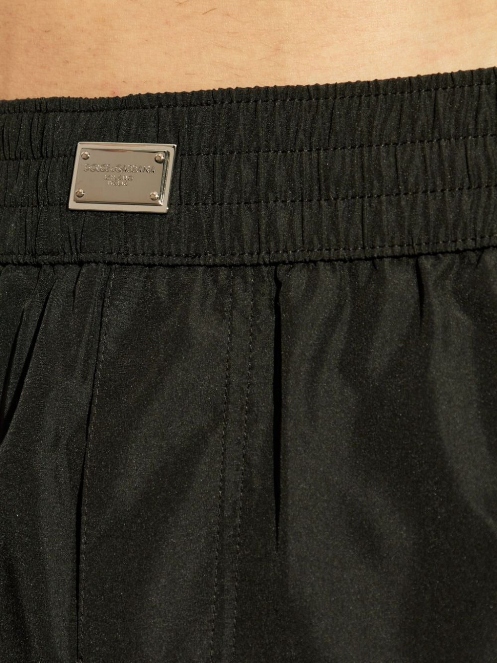 SHORT SWIM TRUNKS WITH TAG