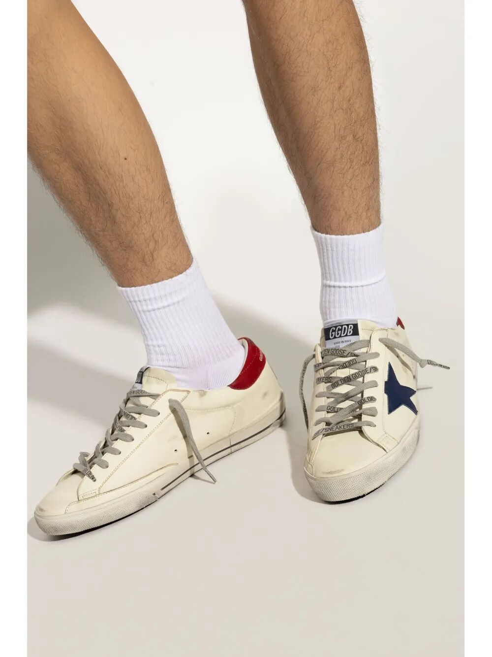 SUPER-STAR SNEAKERS WITH DISTRESSED FINISH, RED LEATHER STAR AND BLUE LEATHER HEEL TAB