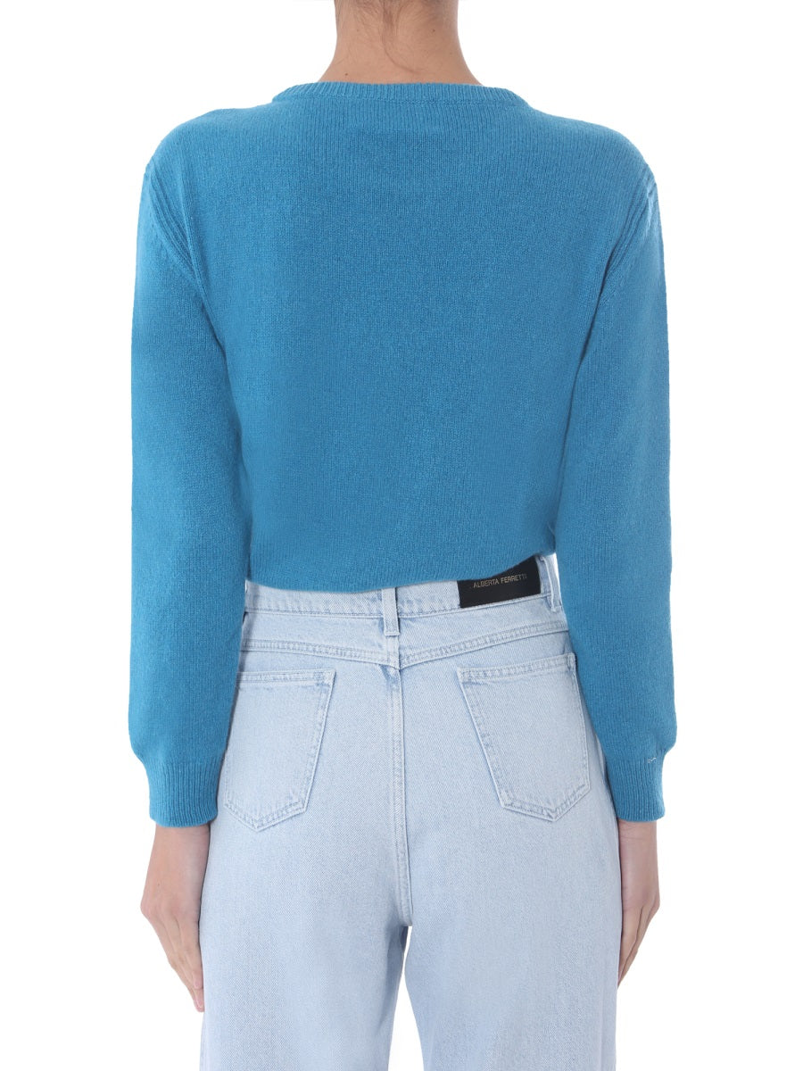 "LOVE ME" SWEATER