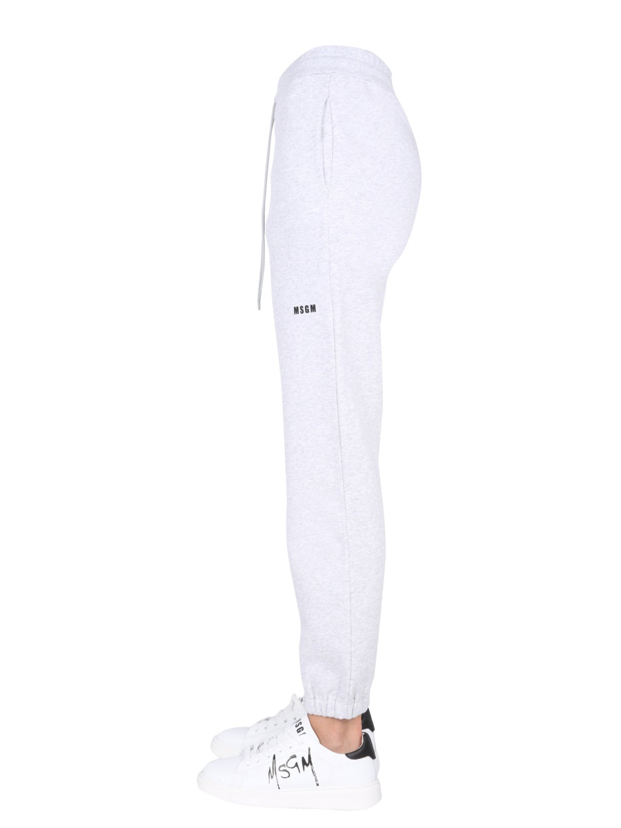 JOGGING PANTS WITH LOGO PRINT