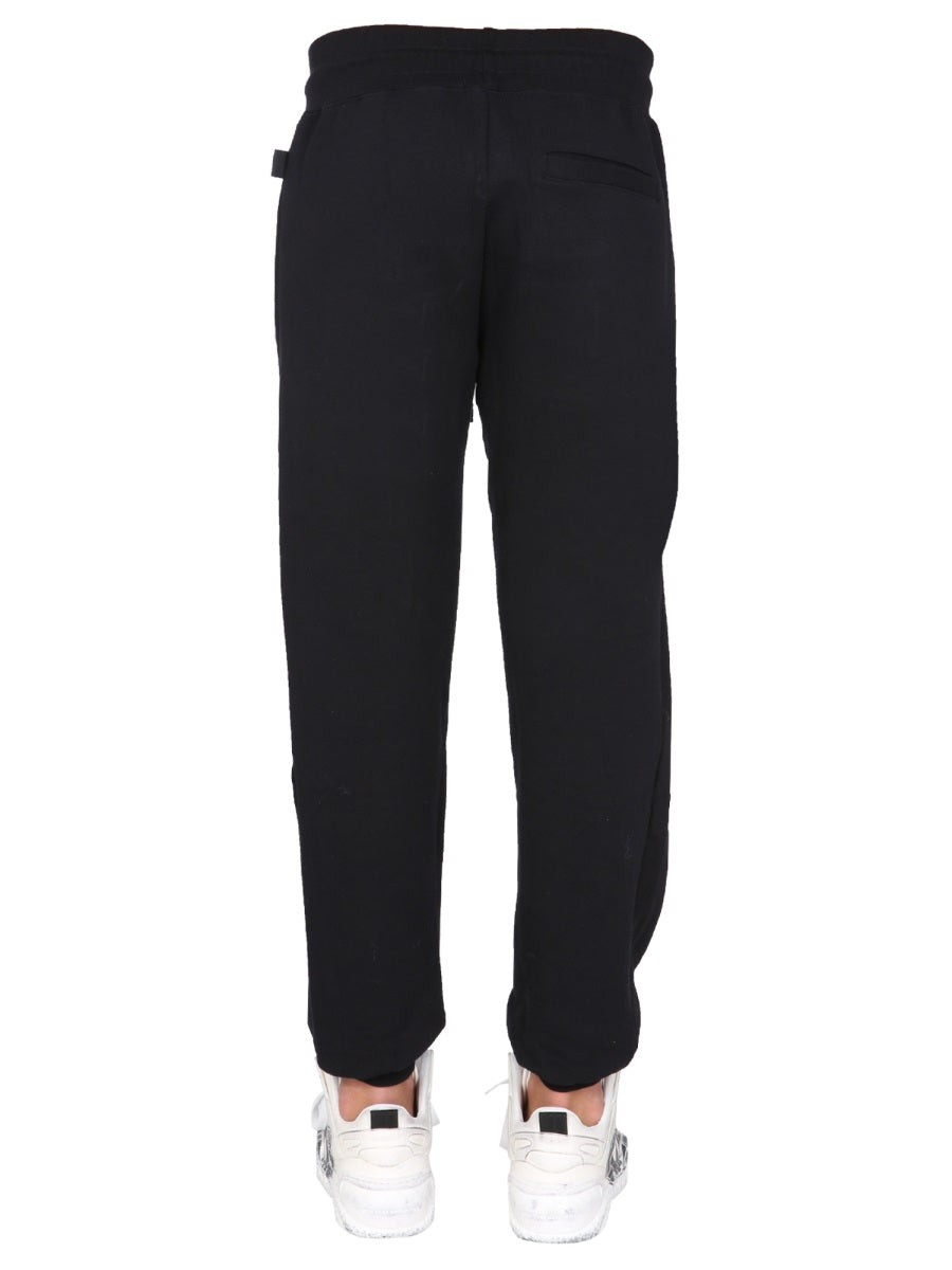 JOGGING PANTS WITH "CUTE TAPE" LOGO BAND