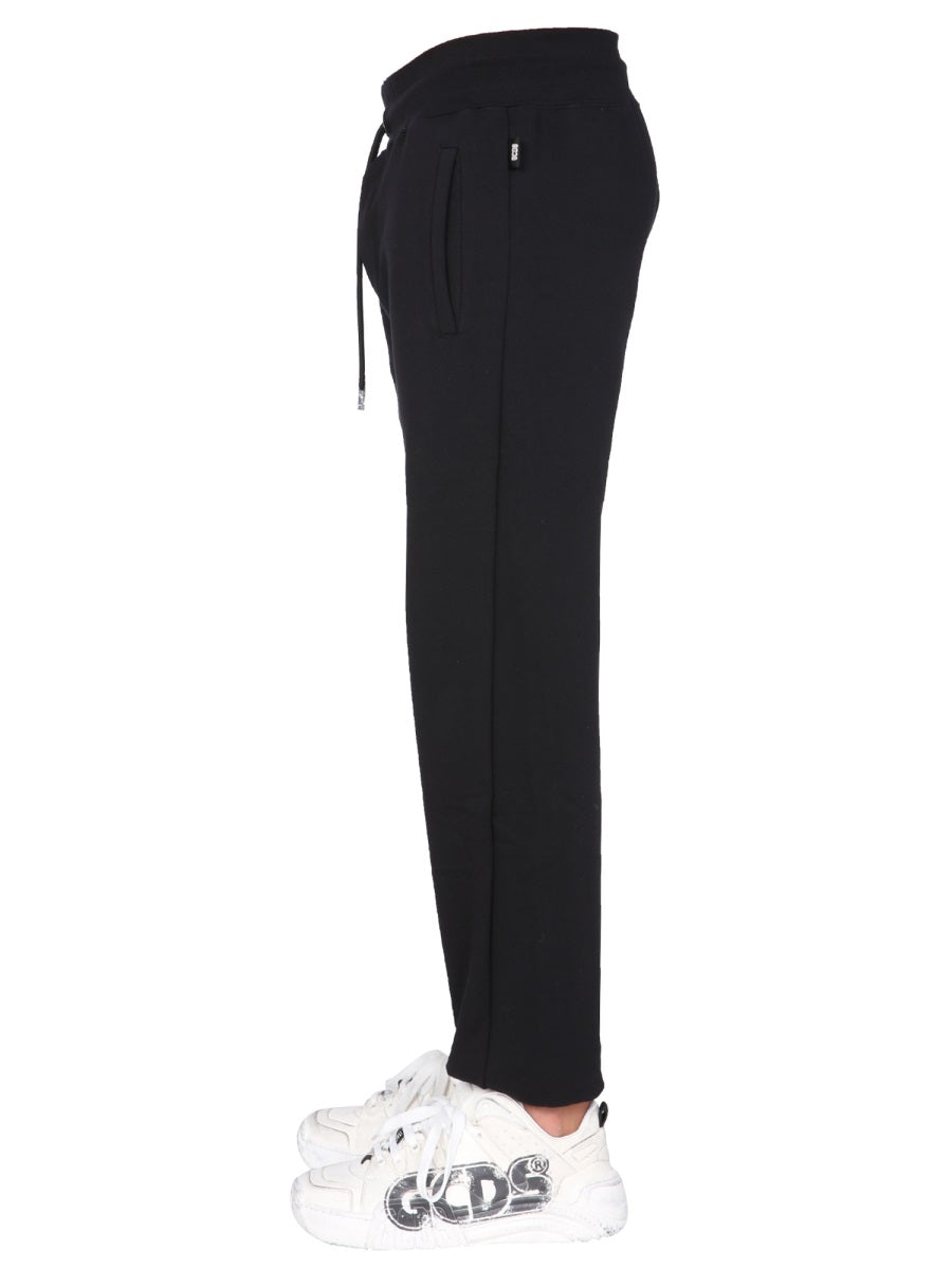 JOGGING PANTS WITH "CUTE TAPE" LOGO BAND