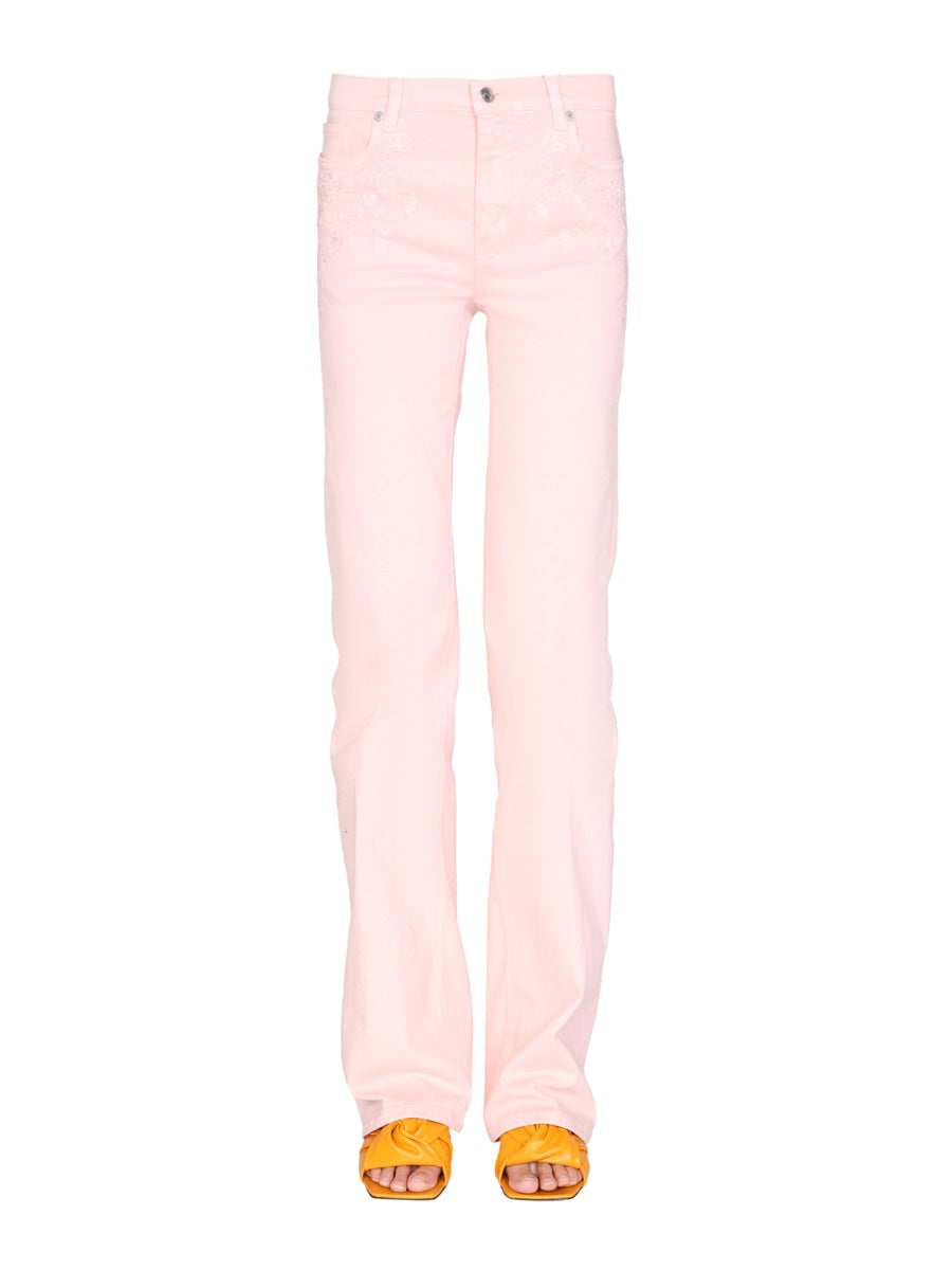 JEANS WITH EMBROIDERED FLORAL DETAIL