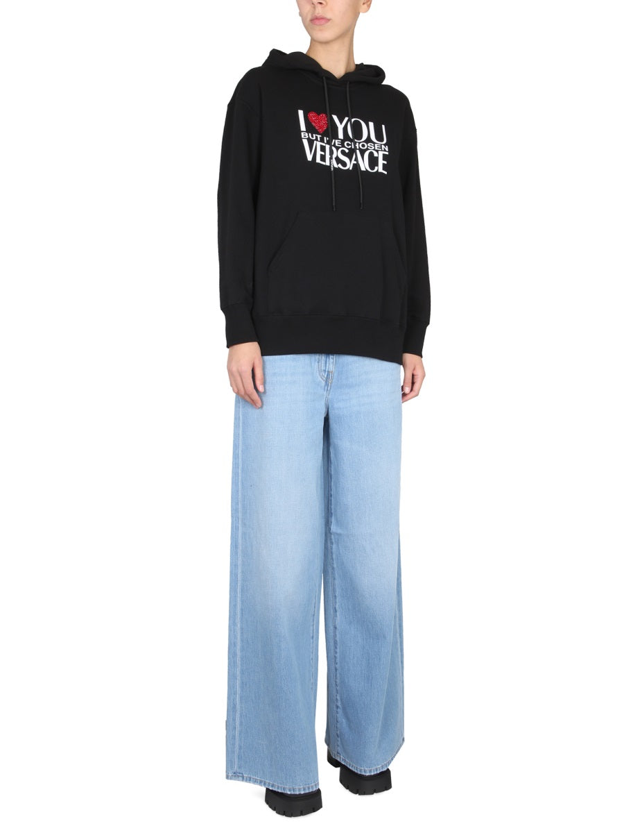 SWEATSHIRT WITH I LOVE YOU LOGO