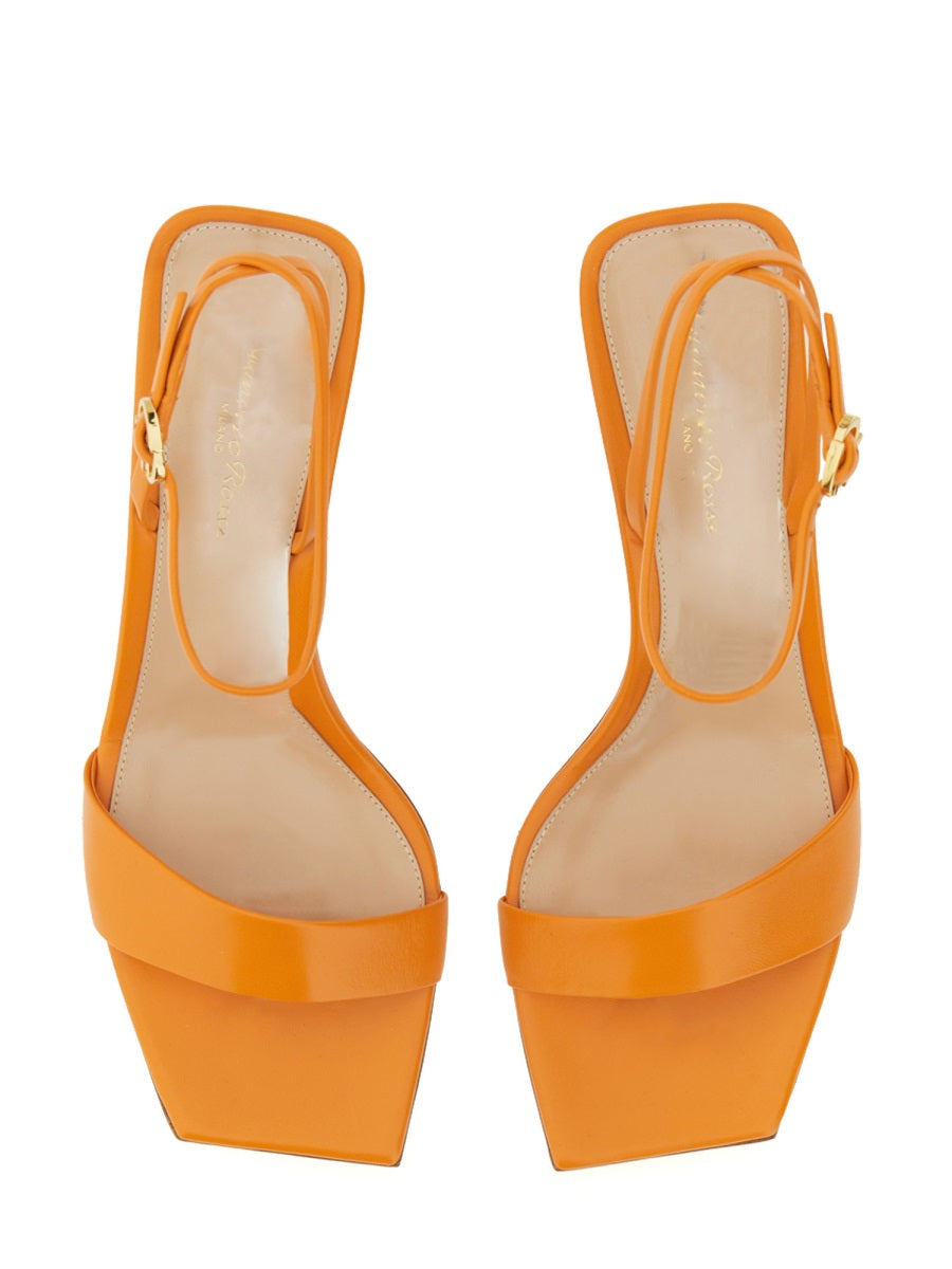 COSMIC SANDAL.