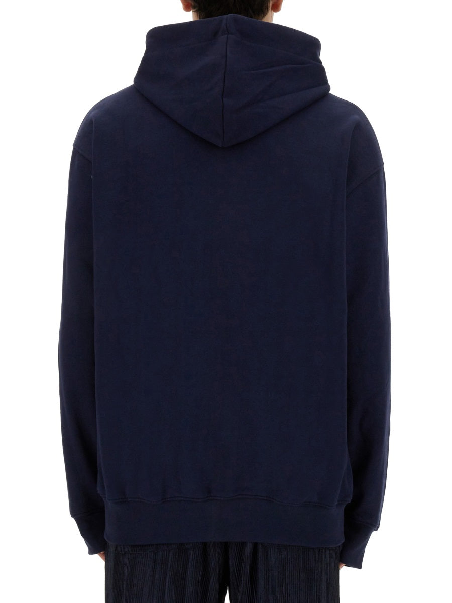 ZIP SWEATSHIRT.