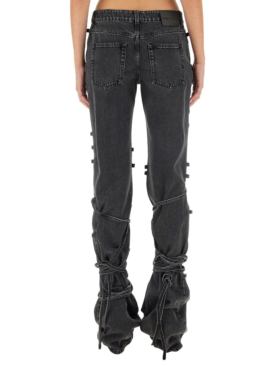 JEANS WITH KNOTTED DETAIL