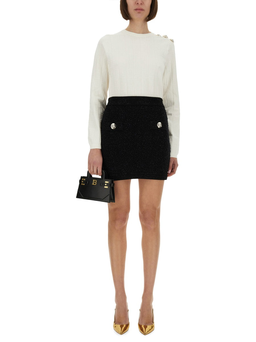 KNITTED TOPS.