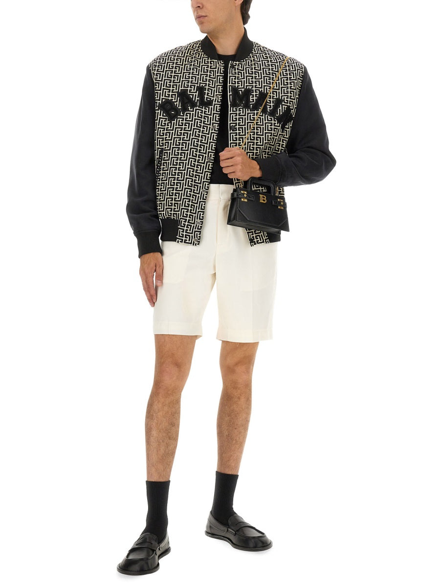 MONOGRAMMED VARSITY JACKET WITH PATCHES