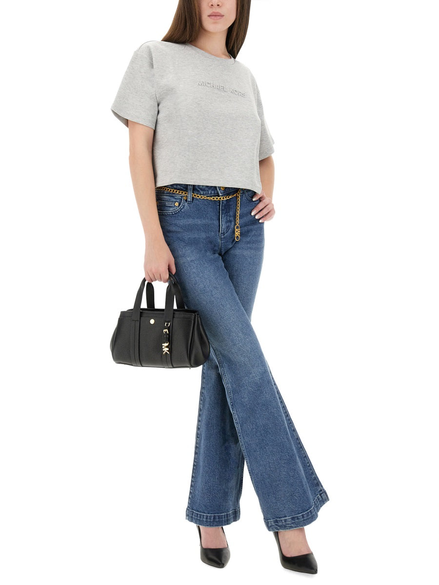 FLARED JEANS WITH BELT