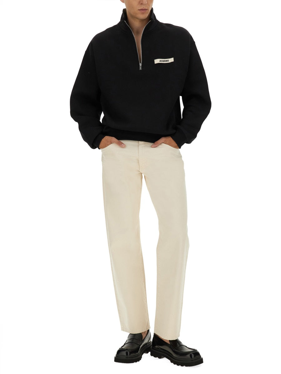 ZIPPERED TURTLENECK SWEATSHIRT