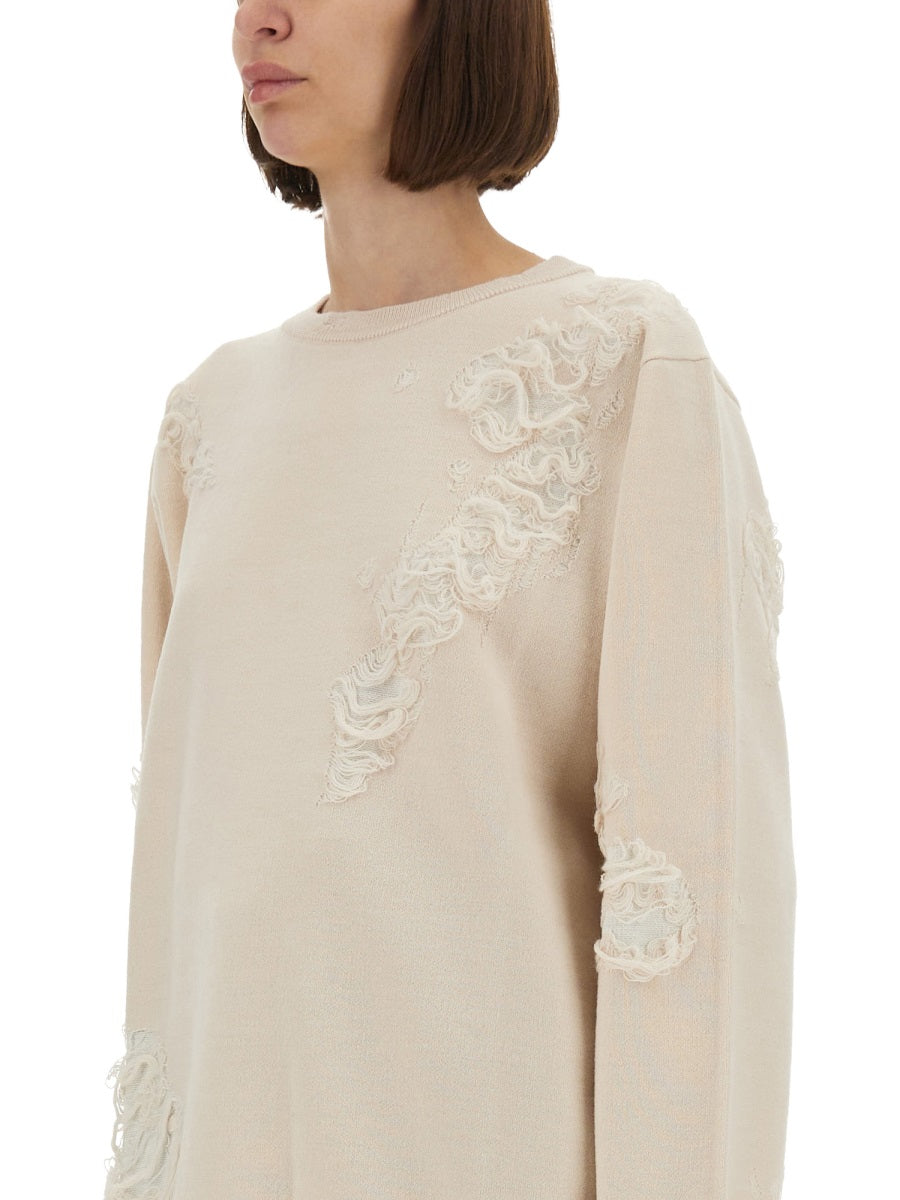 MESH WITH WORN EFFECT DETAILS