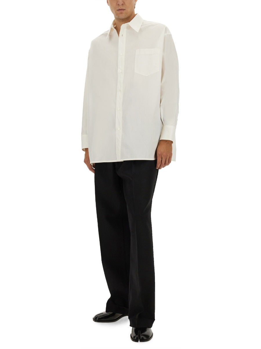 PANTS WITH PLEATS AND BELT