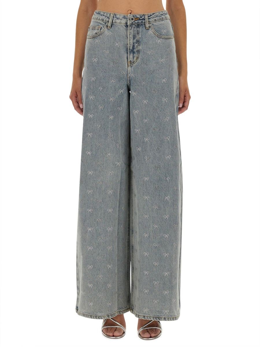 JEANS WITH RHINESTONE BOWS