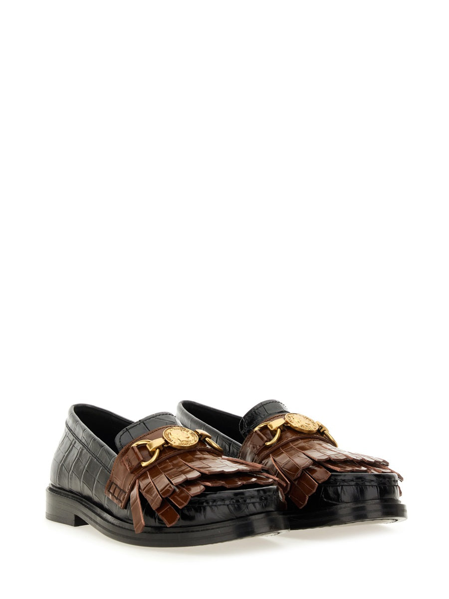 MOCCASIN WITH BANGS AND COIN