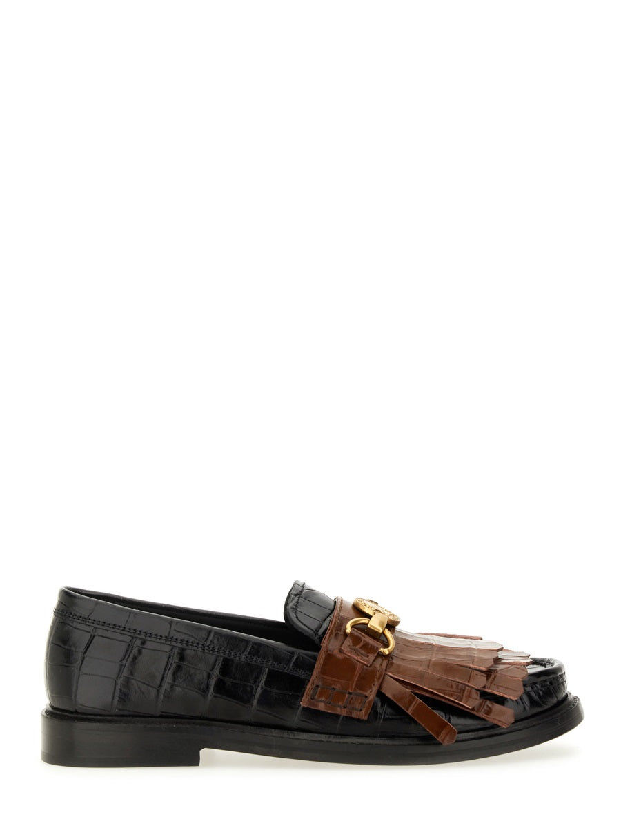 MOCCASIN WITH BANGS AND COIN