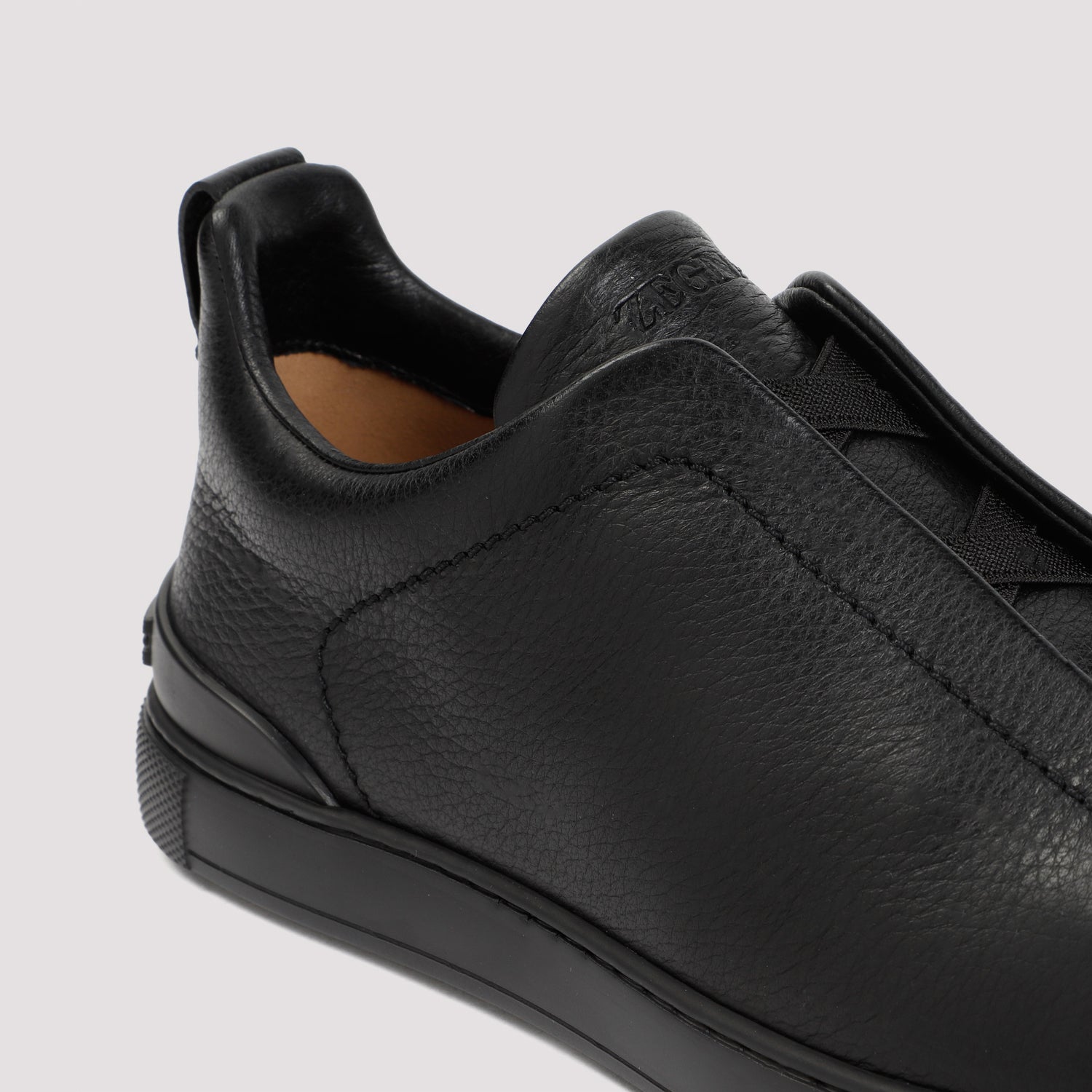 Triple Stitch Sneakers