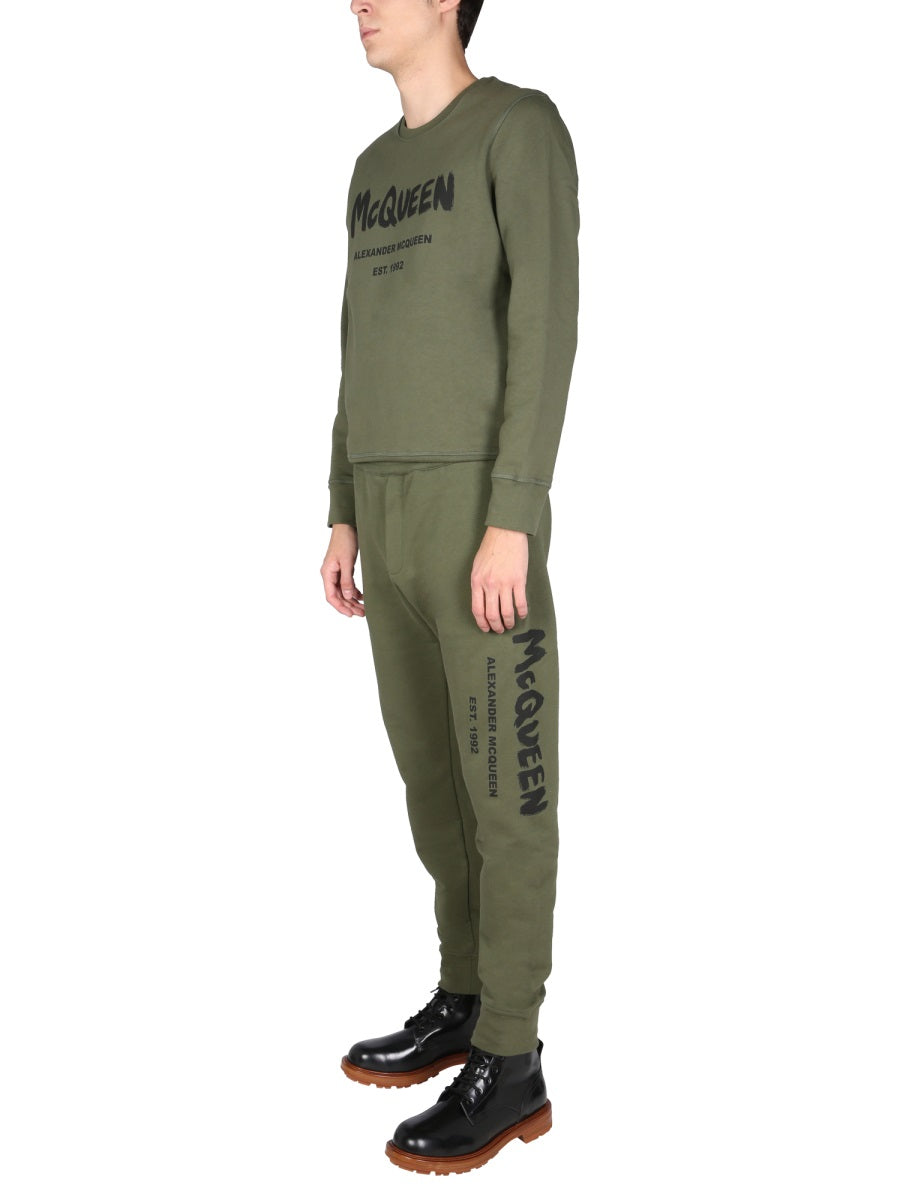 JOGGING PANTS WITH GRAFFITI LOGO