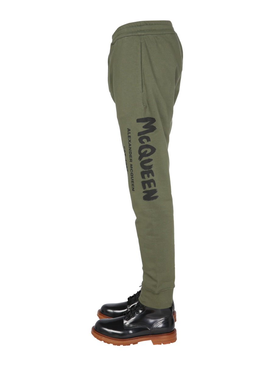 JOGGING PANTS WITH GRAFFITI LOGO