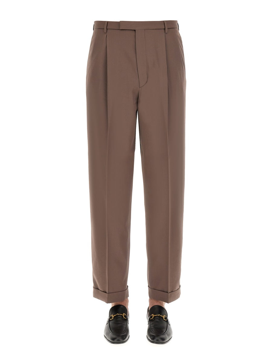 PANTS WITH GUCCI LABEL