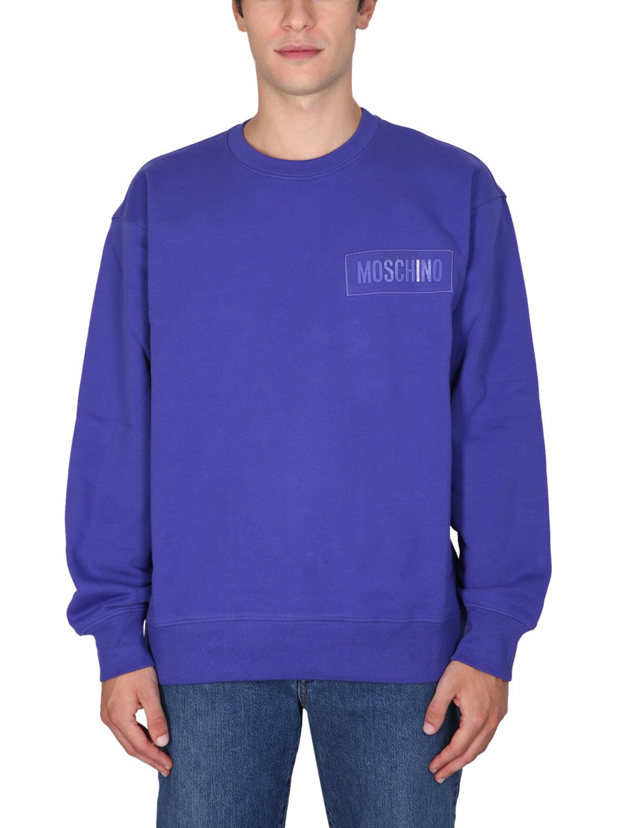 SWEATSHIRT WITH LOGO PATCH