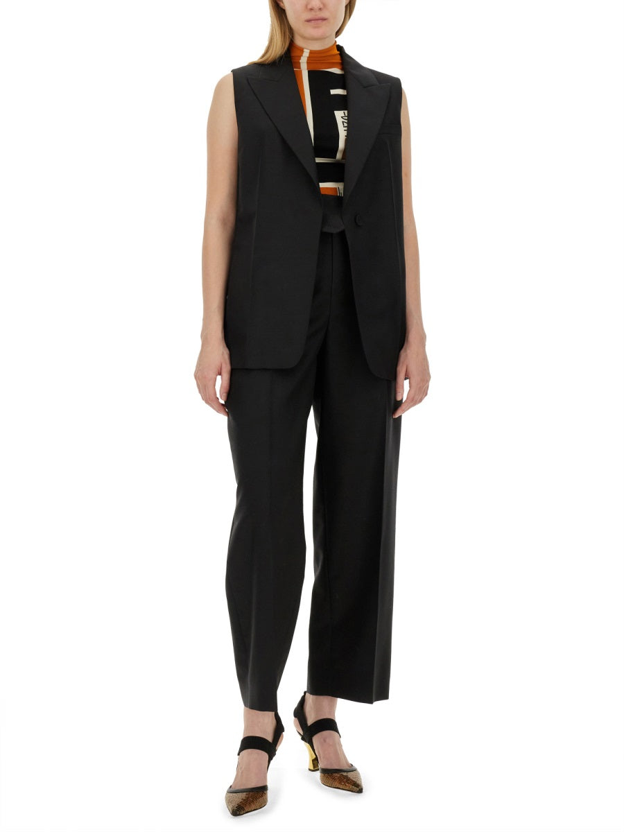 PANTS WITH ASYMMETRICAL WAIST